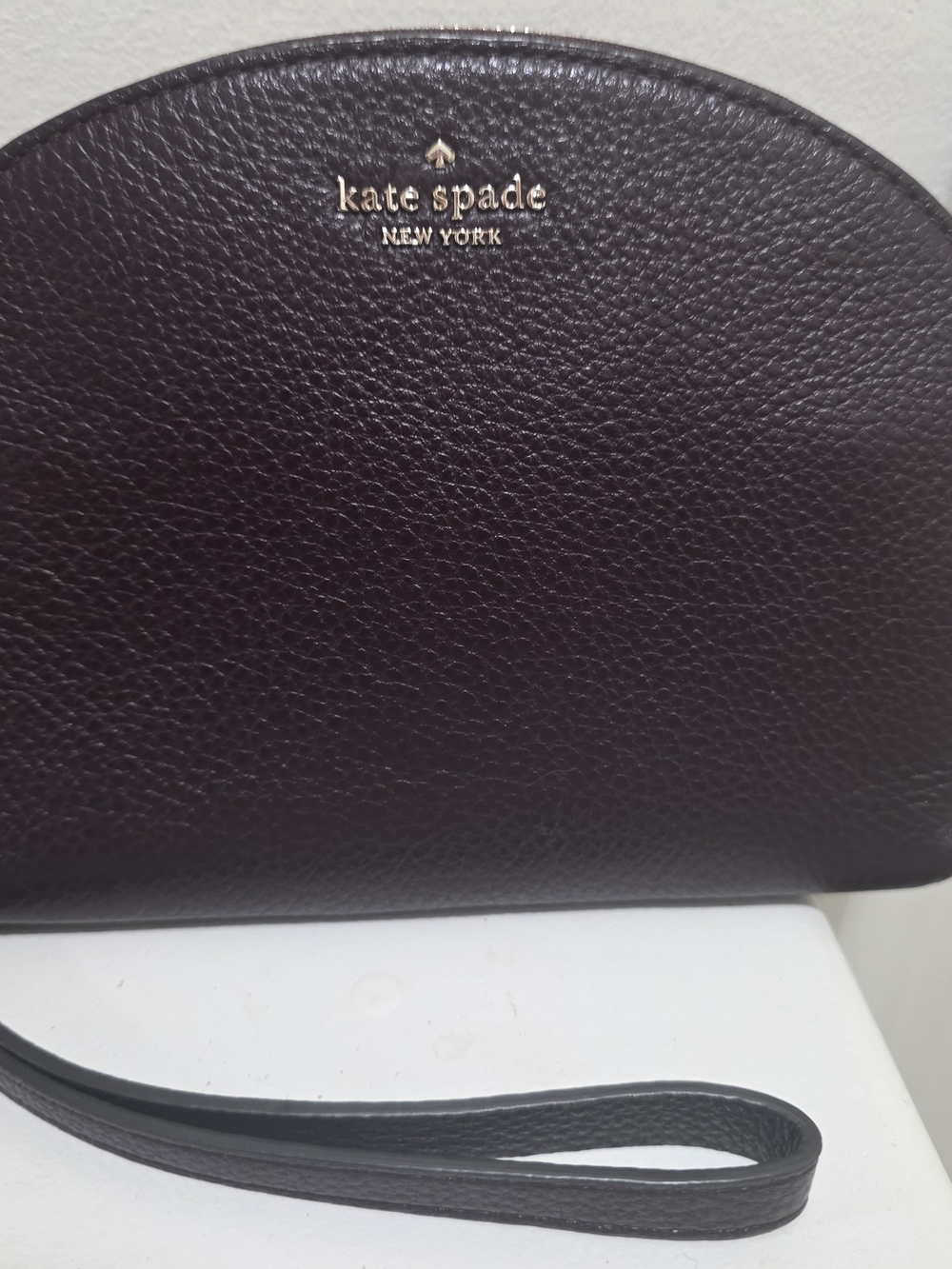 kate spade Pebbled Leather Wristlet in Deep Plum
